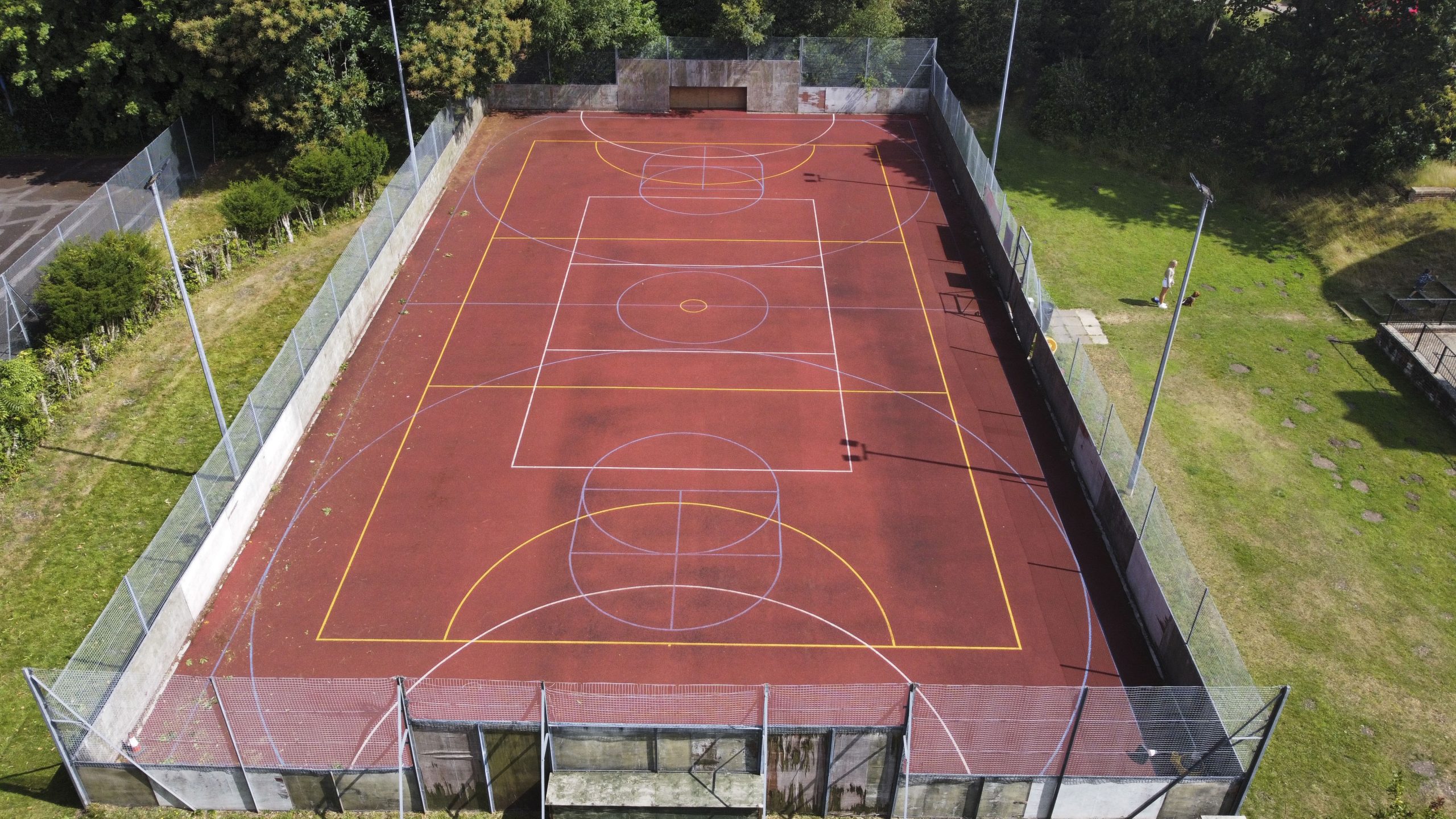 drone photograph of Avon tyrrell sport court in the forest